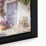 Close-up of a black framed canvas featuring a textured depiction of a colorful Greek door, ideal for living room decor.