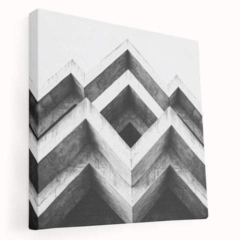 Modern kitchen wall art featuring a large abstract design in muted gray and blue tones on stretched canvas.