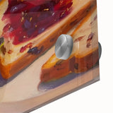 Close-up of large abstract wall art featuring assorted pastries in vibrant colors on acrylic glass.