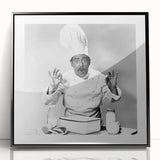 Large abstract wall art featuring silhouetted figures and food items in black and white, framed in acrylic.