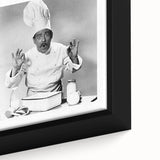 Black wall art featuring a colorful, textured close-up of food and people on a framed canvas, ideal for living room decor.