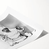 Extra large wall art featuring line art flowers in black and white on a rolled canvas, ideal for large living room decor.