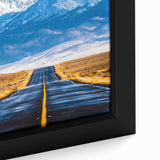 Close-up of a framed landscape canvas featuring vibrant colors and intricate details of abstract nature art, perfect for modern home decor and artistic interior design.