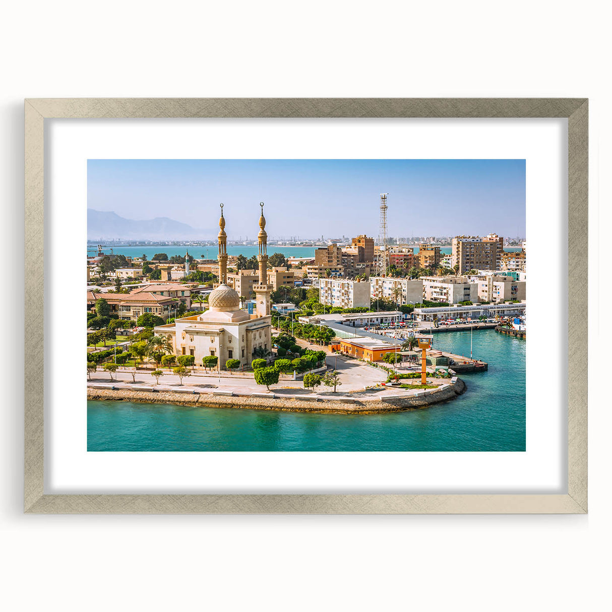 Abstract art print of an Egyptian landscape in muted earth tones on a framed silver mat, ideal for dining room decor.