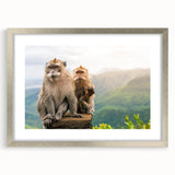 Abstract art print of a Mauritian landscape in muted blue and green tones, framed in silver, suitable for dining room decor.