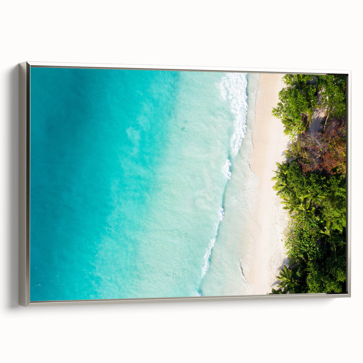 Landscape art painting of Seychelles with colorful trees and ocean, vintage poster style framed in silver.