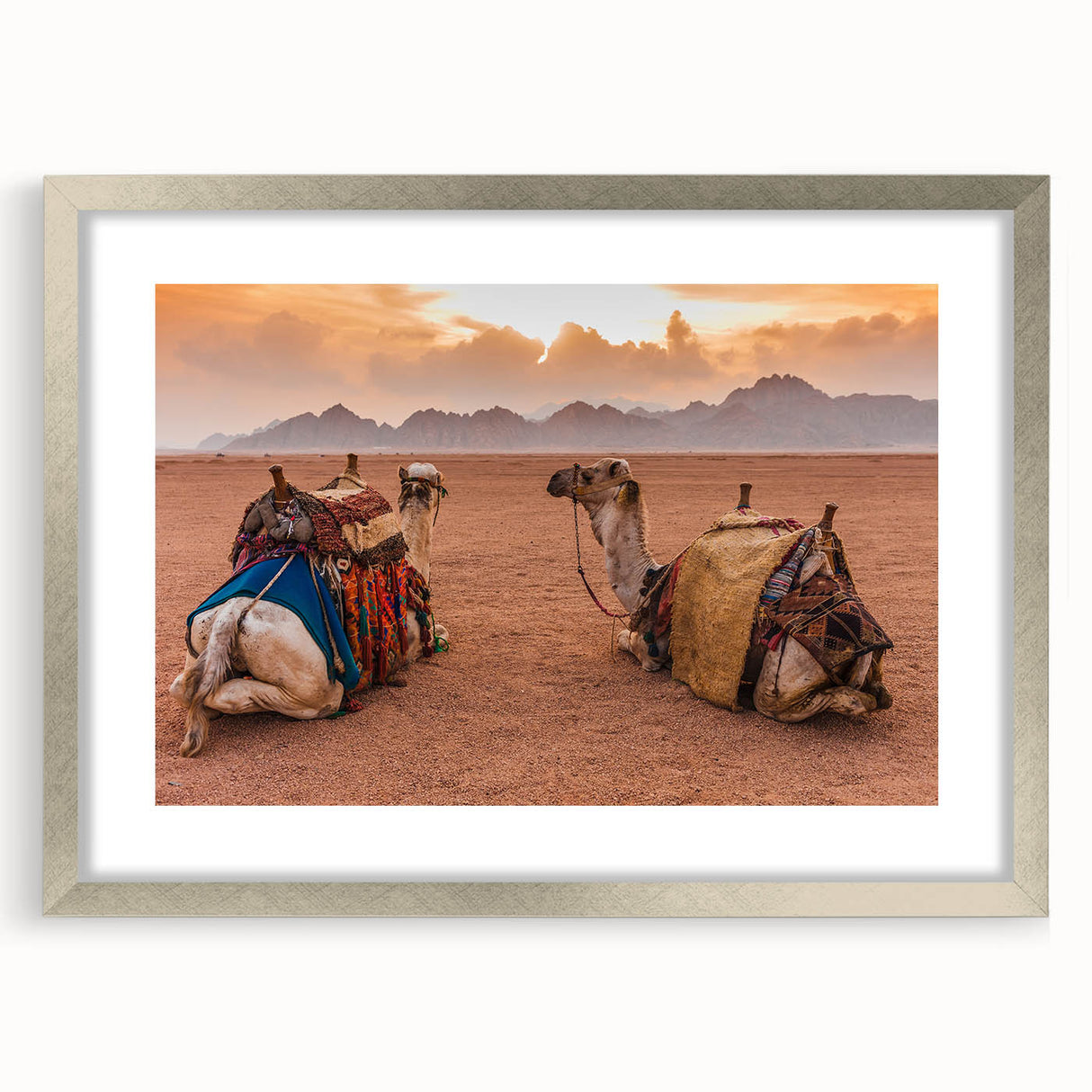 Textured art of abstract Tunisian landscape in earth tones on a silver-framed mat, suitable for bedroom decor.
