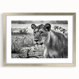 Textured abstract art print depicting an African scenery in muted earth tones on a framed canvas, suitable for bedroom art.