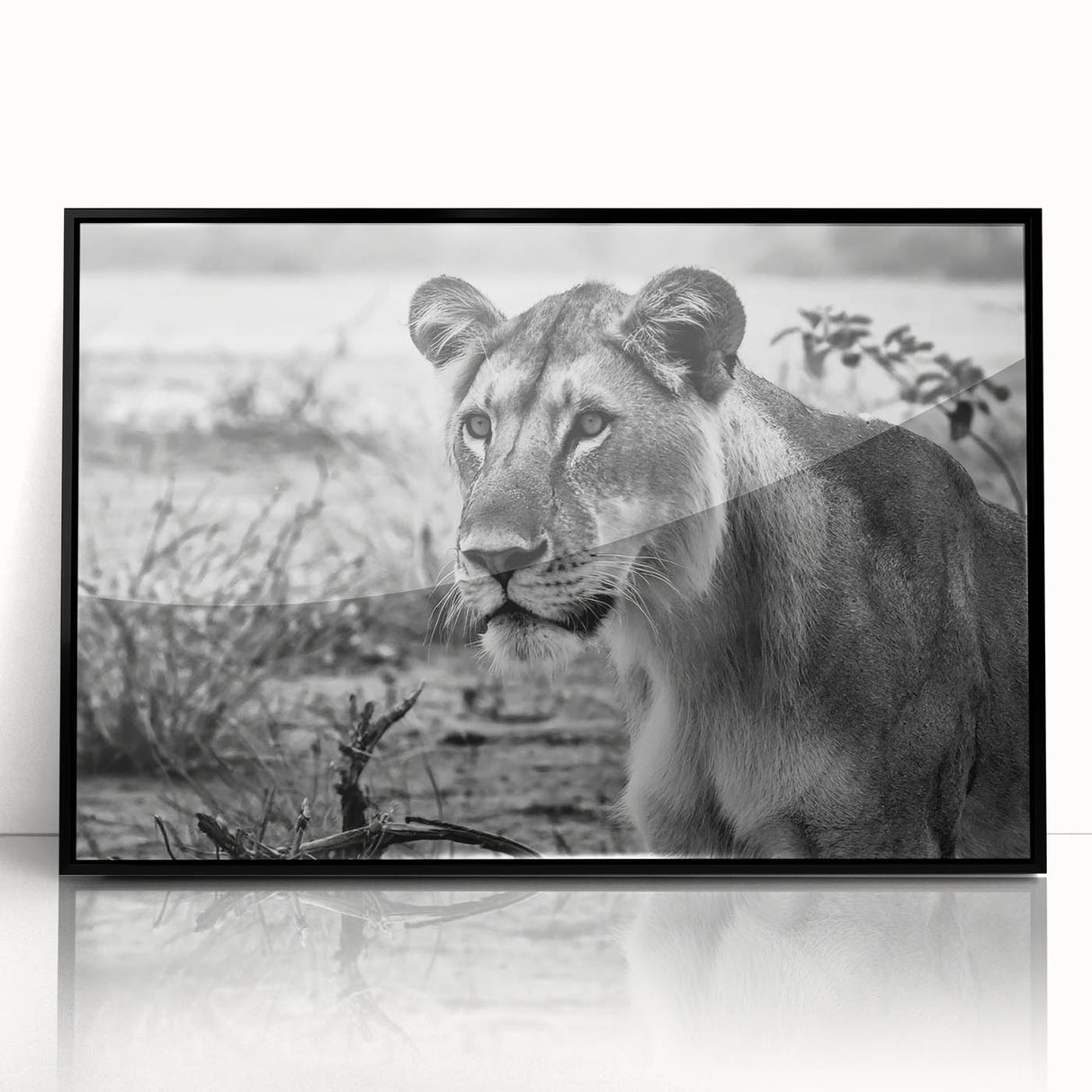 Large abstract wall art depicting African scenery in muted earth tones on a framed acrylic.