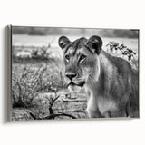 Framed canvas depicting a colorful African landscape with vibrant sunset hues, ideal for enhancing a living room's decor.