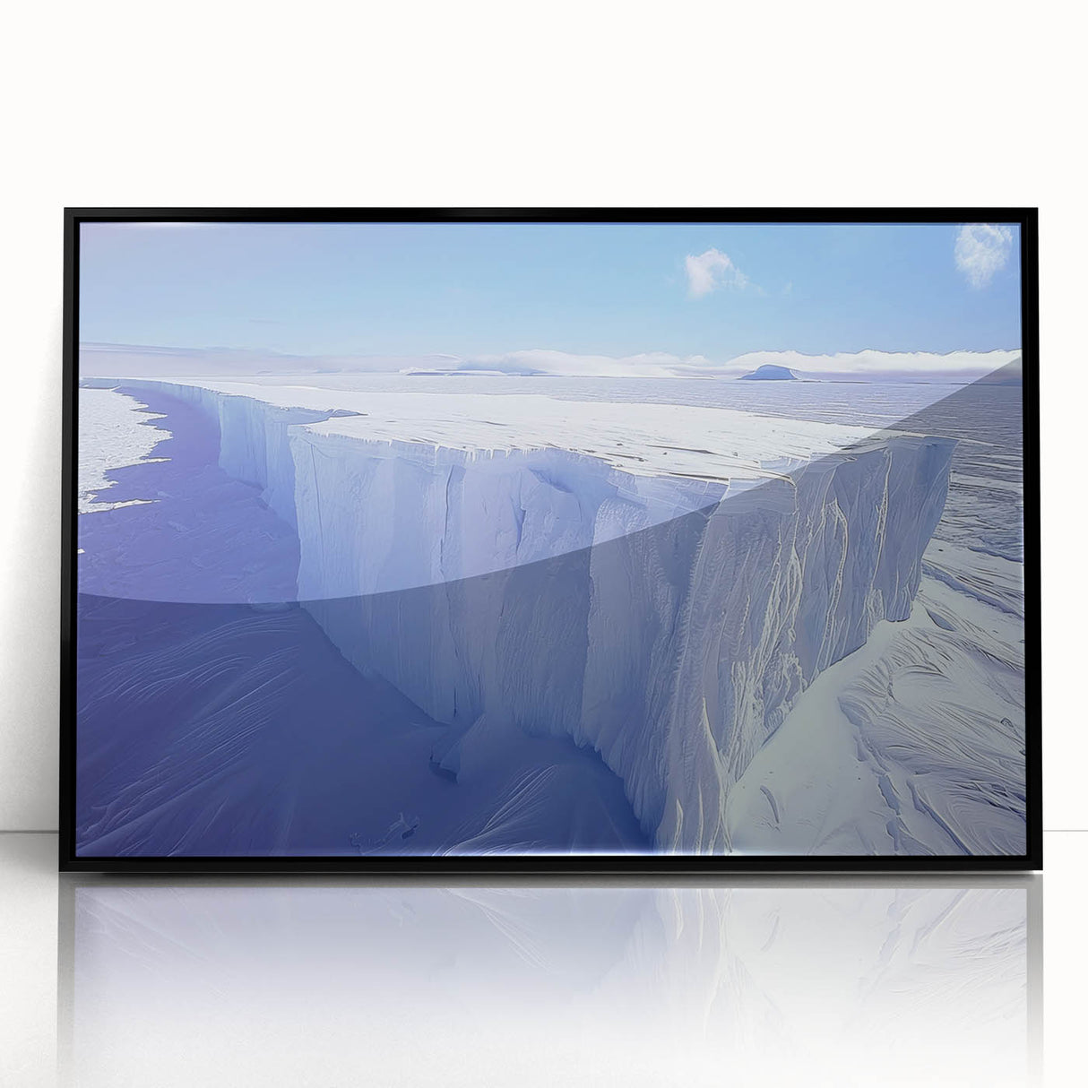 Large abstract wall art depicting an Antarctic landscape in muted gray and blue tones, framed in black acrylic.