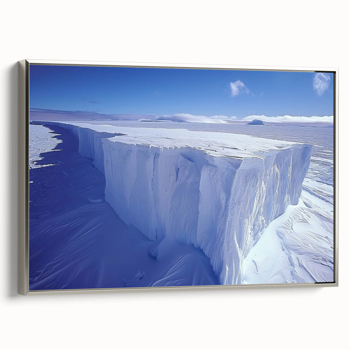 Framed canvas landscape art painting depicting the icy terrain of Antarctica in muted gray and blue tones.