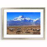 Textured art depicting an abstract Tibetan landscape in muted earth tones, framed in silver, ideal for bedroom art.