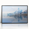 Large abstract wall art of Hong Kong skyline in muted grays and blues on a framed acrylic.