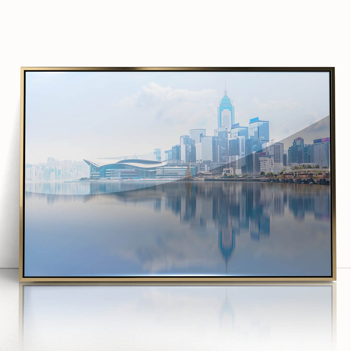 Framed acrylic print of Hong Kong skyline in gold and blue tones, mid-century modernist style.