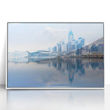 Framed acrylic print of Hong Kong skyline in art deco style with muted gray and blue tones, ideal for modern art wall decor.