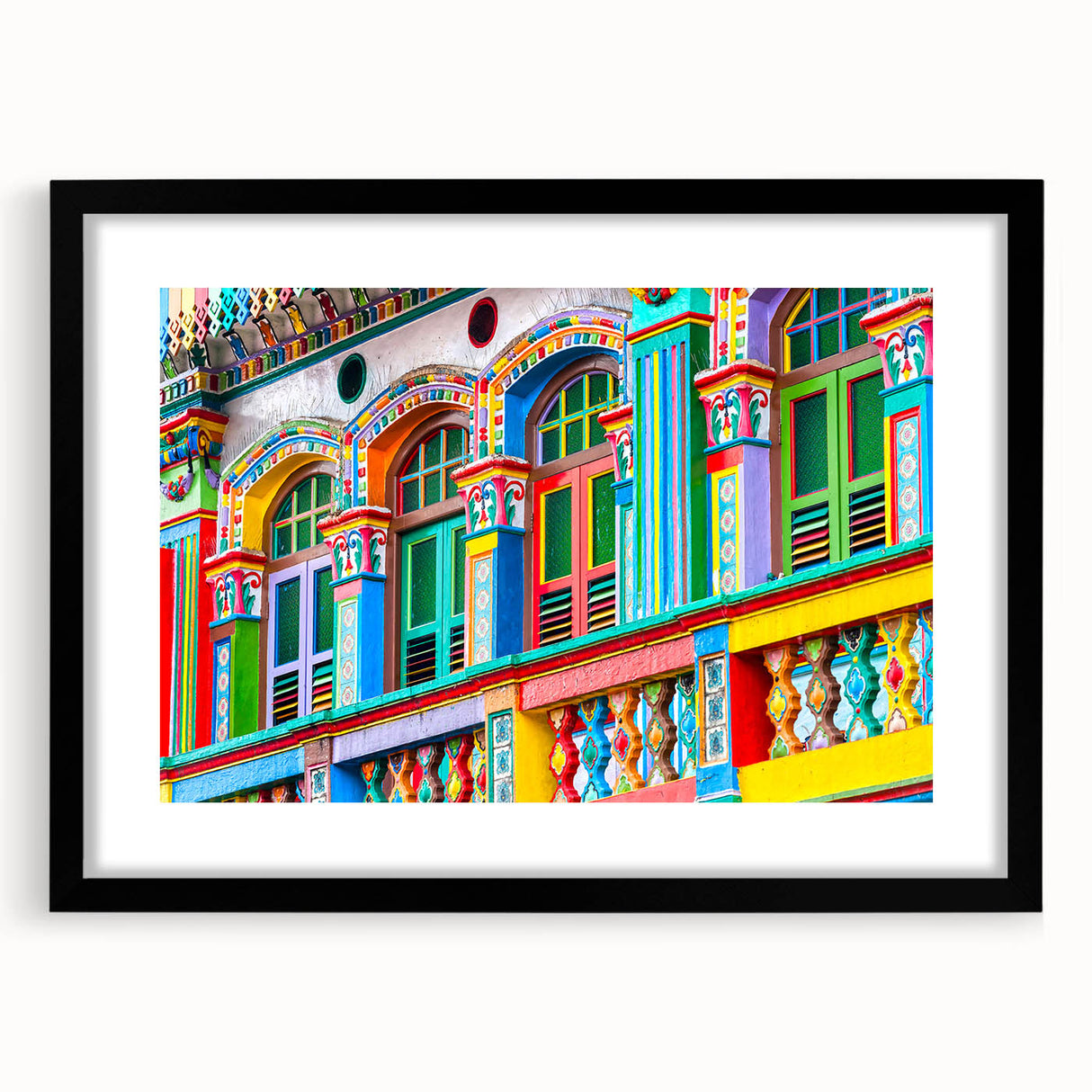 Extra large abstract art print featuring vibrant, colorful textures of Indian scenery on a black framed canvas.