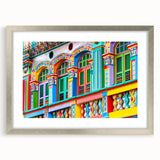 Textured abstract art print depicting an Indian scenery in muted earth tones on a framed canvas.