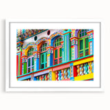 Abstract art print of a stylized Indian landscape in soft earth tones on a framed white canvas.