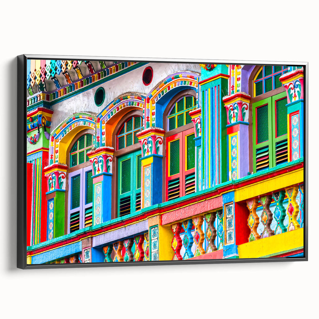 Black and white framed canvas featuring a vintage-style landscape painting of an Indian scenery.