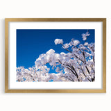 Abstract art print featuring textured strokes in gold and black on a large canvas, ideal for living room decor.