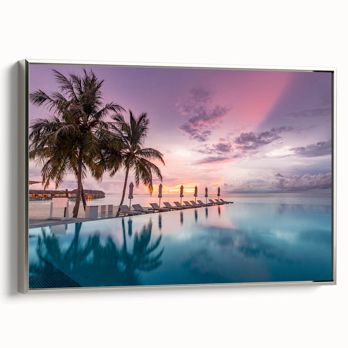 Landscape art painting of a serene Maldivian beach on a framed canvas, featuring muted blues and greens.