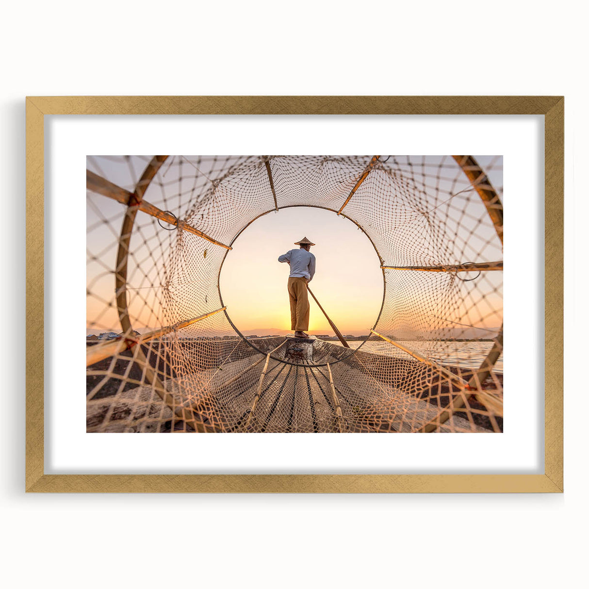 Extra large wall art featuring an abstract interpretation of a Myanmar landscape in gold and earth tones on a framed canvas.