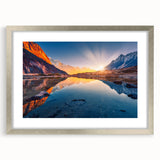 Textured art print of an abstract mountain landscape in cool blue and gray hues, framed in silver, ideal for bedroom art.