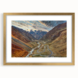 Extra large abstract art print of a textured landscape in muted earth tones, framed in gold, ideal for living room decor.