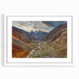 Abstract art print of a Pakistani landscape in muted earth tones on a white framed canvas, suitable for dining room decor.
