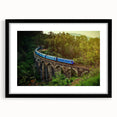 Colorful abstract art print of a Sri Lankan scenery in a black frame with a mat.