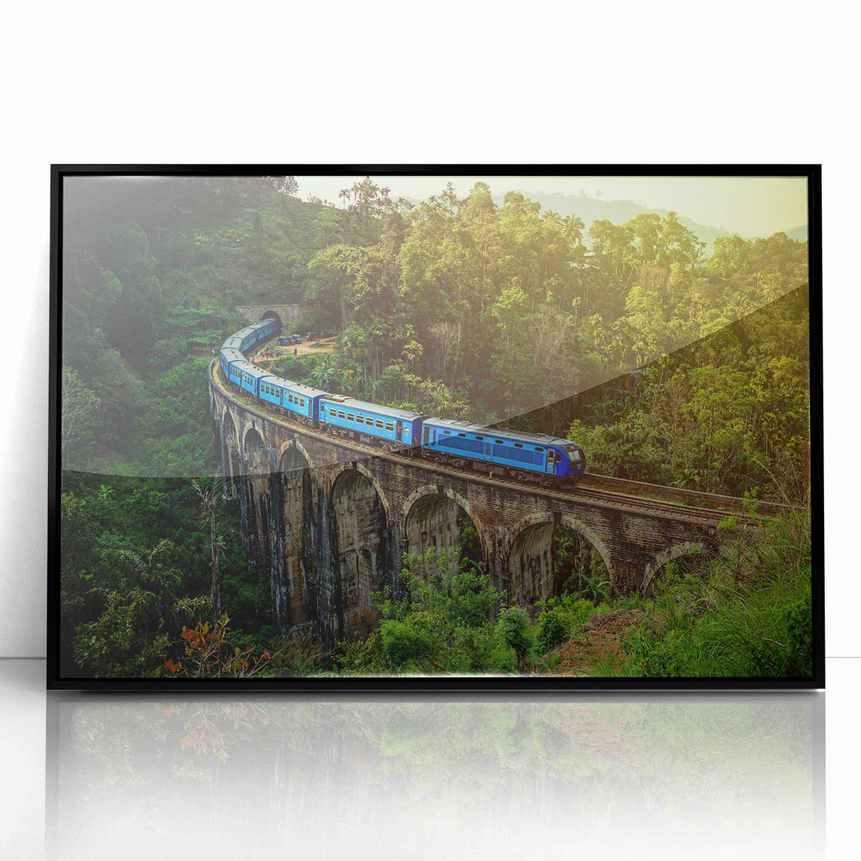 Large abstract wall art depicting a stylized Sri Lankan landscape in muted earth tones, framed in black acrylic.