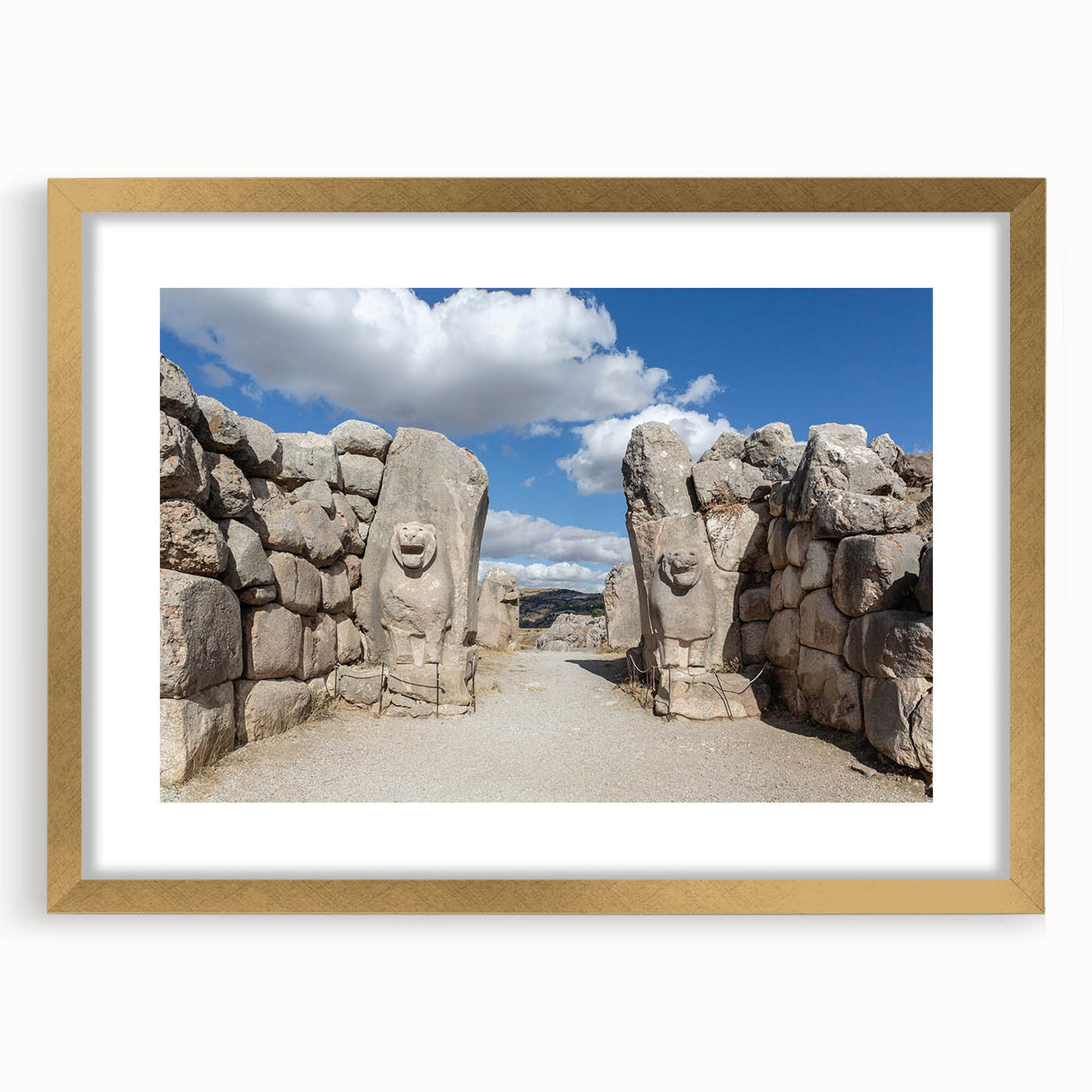 Extra large abstract art print featuring a textured depiction of a Turkish landscape in gold and earth tones.