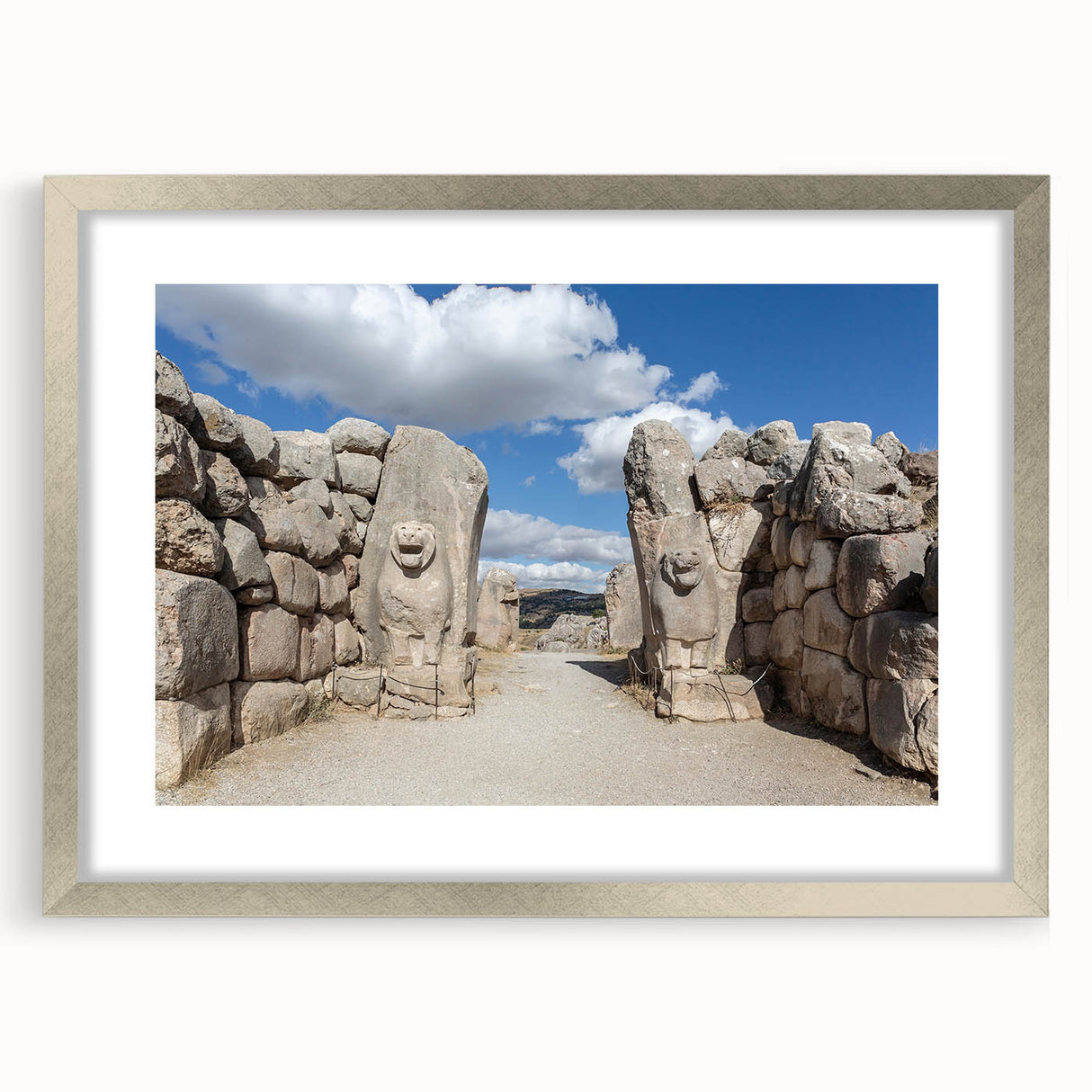 Textured abstract art print depicting a serene Turkish landscape in muted earth tones, framed in silver.