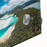 Abstract depiction of the Great Barrier Reef in vibrant blue and green tones on an acrylic print.