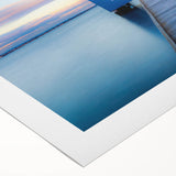 Art deco poster of Perth skyline in muted blue and green hues on rolled canvas, suitable for dining room decor.