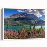 Vintage poster art of Yukon scenery on a framed canvas, featuring a colorful palette, ideal for living room decor.