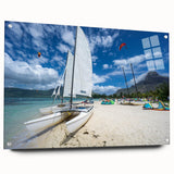 Large abstract wall art depicting Caribbean scenery in vibrant blue and green tones on acrylic glass.