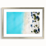Extra large wall art depicting an abstract Caribbean seascape in textured blues and greens, framed in silver.