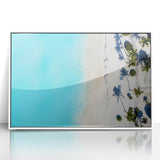 Mid-century modernist art depicting a serene Caribbean scene in cool blue tones, acrylic print framed in white.