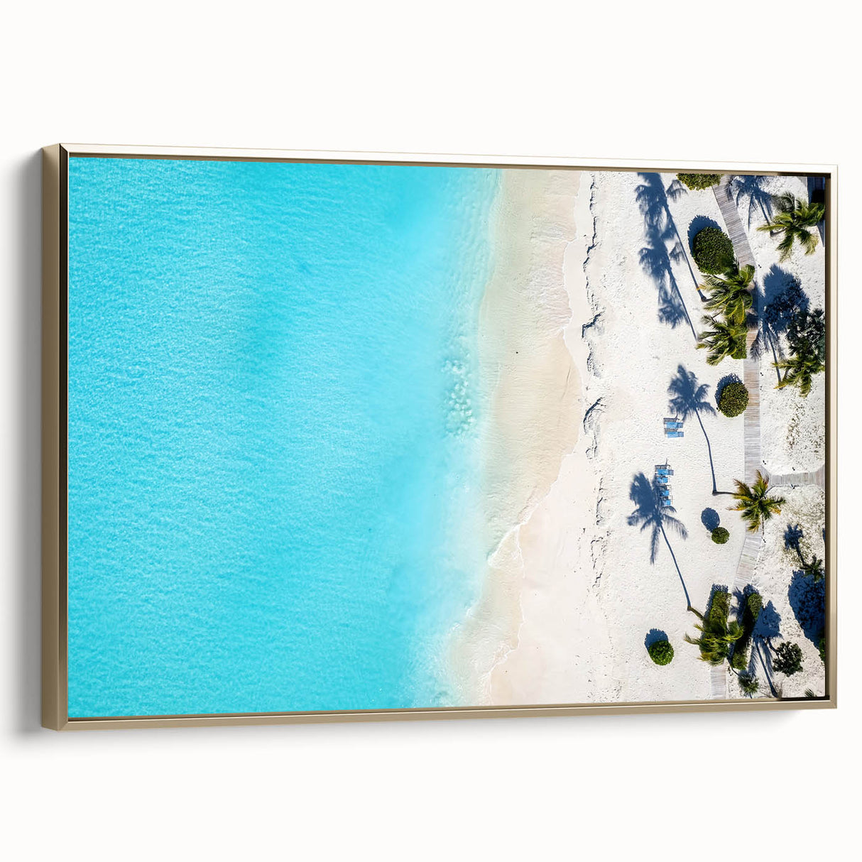 Framed canvas wall art depicting a vintage-style Caribbean landscape with lush greens and deep blues.
