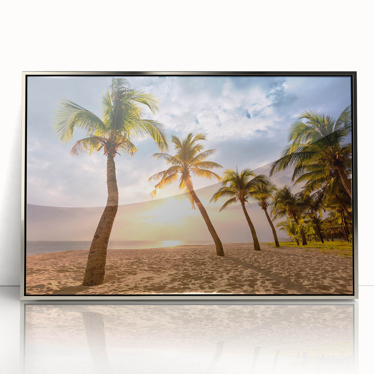 Large art print of a Caribbean seascape, in pastel blue and green tones, framed in silver acrylic.