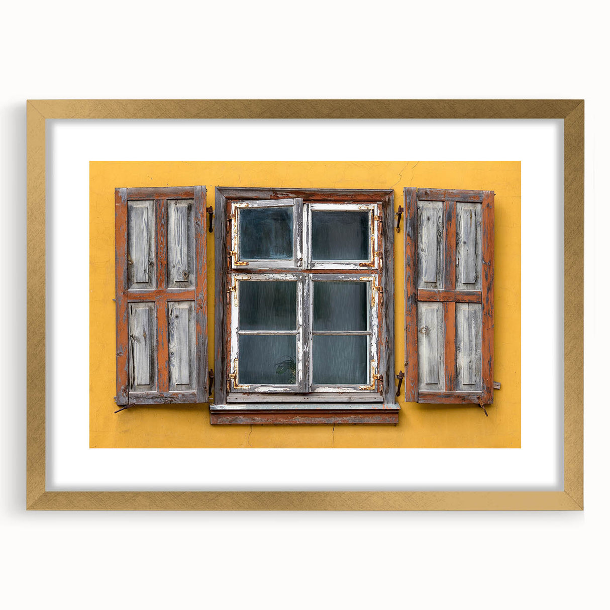 Abstract art print of a Caribbean landscape in muted blue and green tones on a framed canvas.