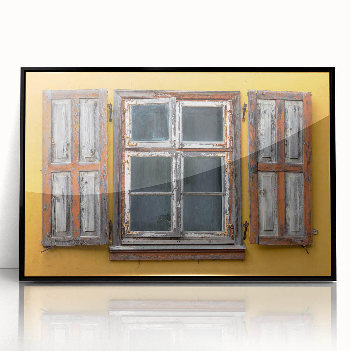 Large abstract wall art depicting a Caribbean scenery in muted blue and green, framed in black acrylic.