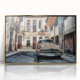 Art deco poster of a Caribbean scenery with vibrant blue and green hues on a gold-framed acrylic.