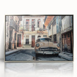 Large art print of a Caribbean beach scene in muted blues and greens, framed in silver acrylic.