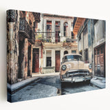 Colorful Caribbean street scene on stretched canvas, featuring vintage cars and colonial buildings.
