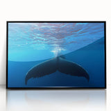 Large abstract wall art depicting a Caribbean scenery in muted blue and green tones on a framed acrylic.