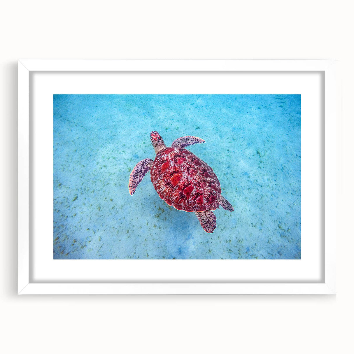 Textured art print of an abstract Caribbean scenery in muted blue and green tones on a framed white mat.