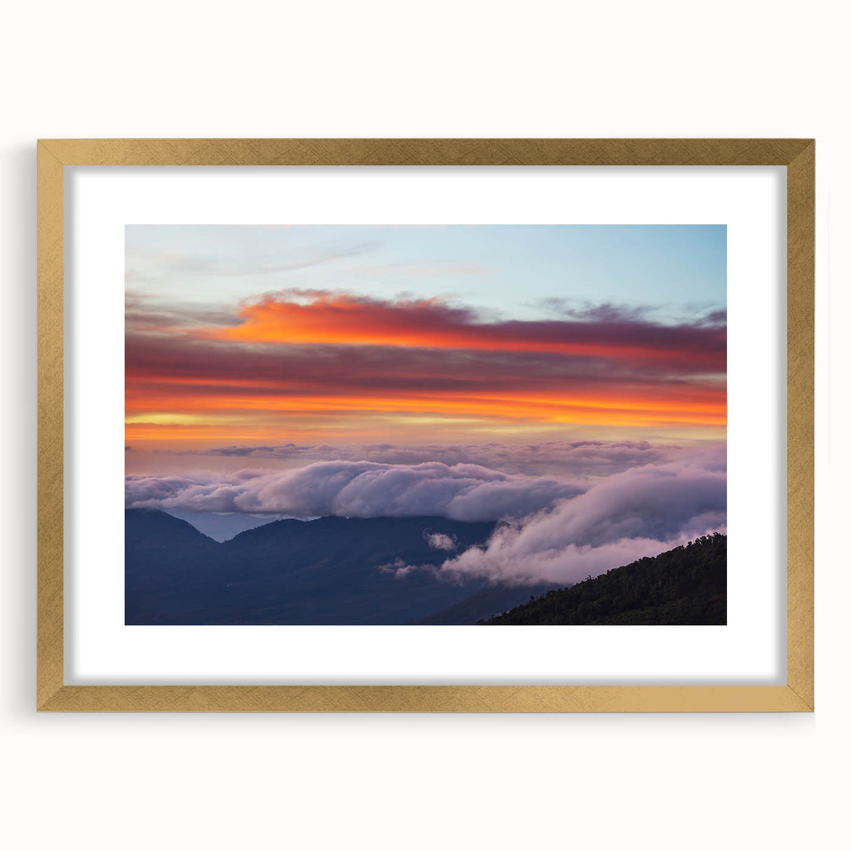Abstract art print of Central American scenery in gold frame, featuring textured brush strokes in earth tones.